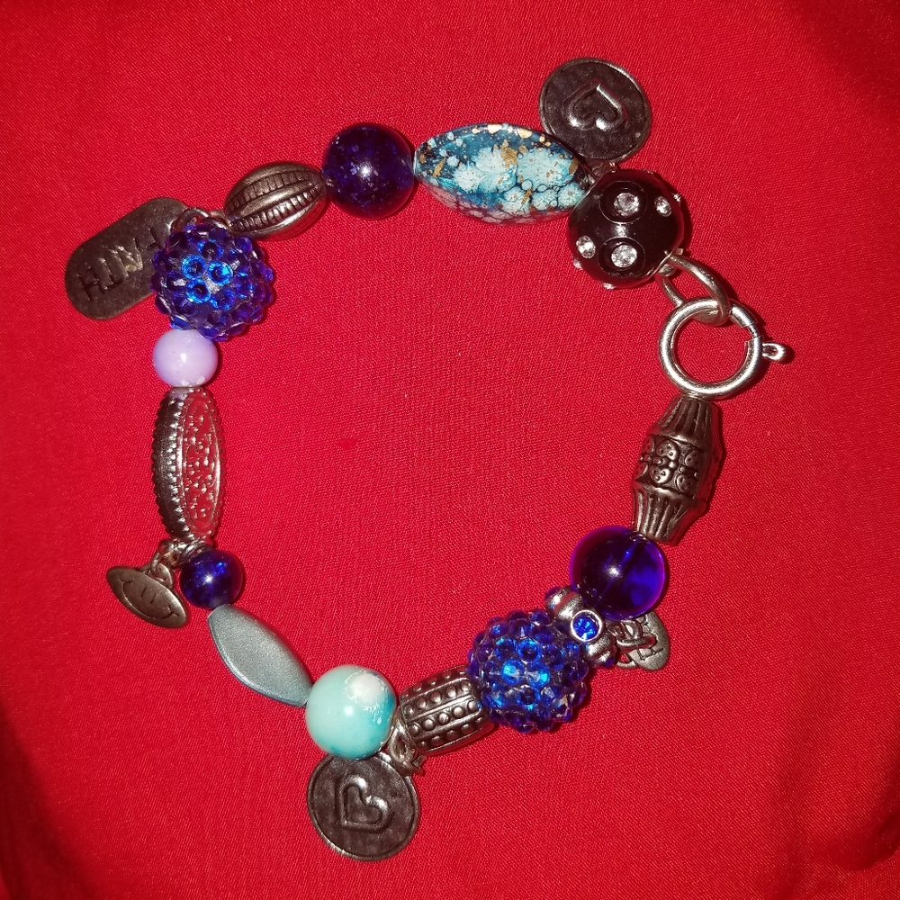 A blue beaded charm bracelet